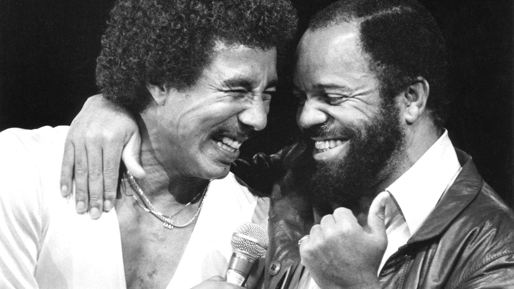 Smokey Robinson, Berry Gordon Jr. hugging