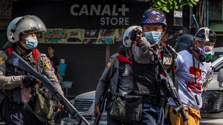 Military police prowl the streets as anti-coup protests rage in Myanmar