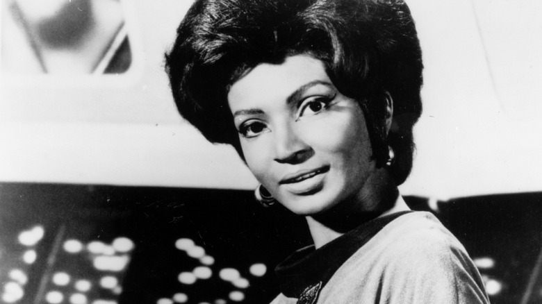 Nichelle Nichols as Lieutenant Nyota Uhura.