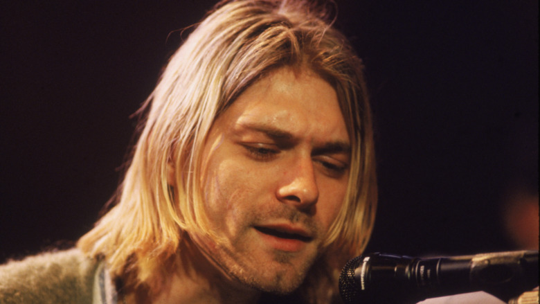 Kurt Cobain singing at mic