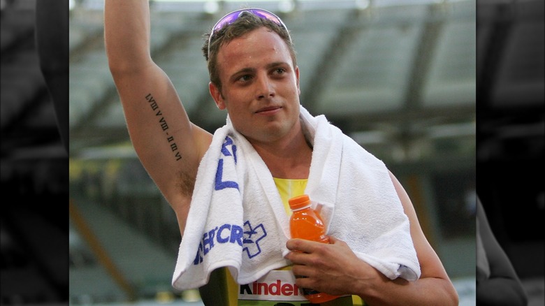 Oscar Pistorius raising right arm