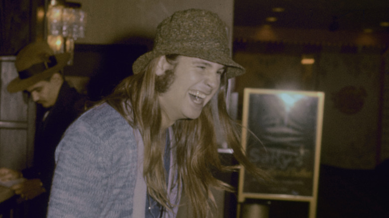 Ozzy Osbourne laughing in a pub in 1980