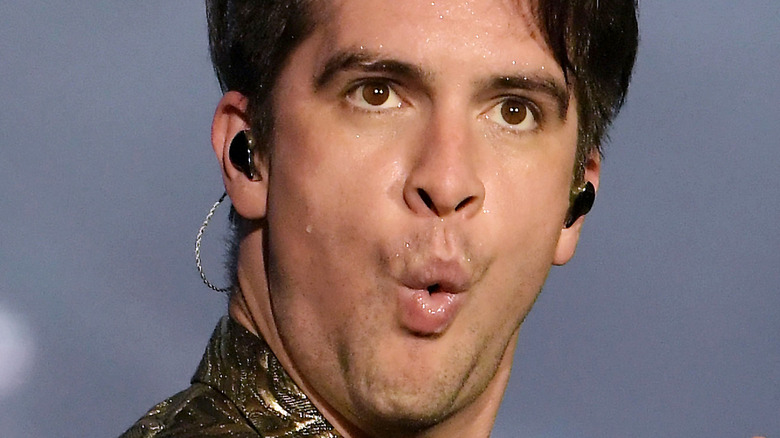 Brendon Urie pulling a face on stage