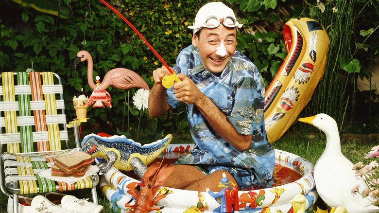 Paul Reubens as Pee-wee in a kiddie pool