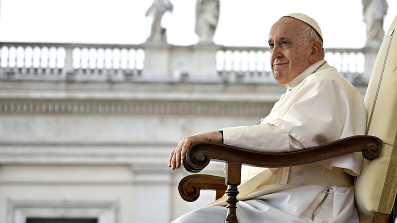 Pope Francis sitting in chair