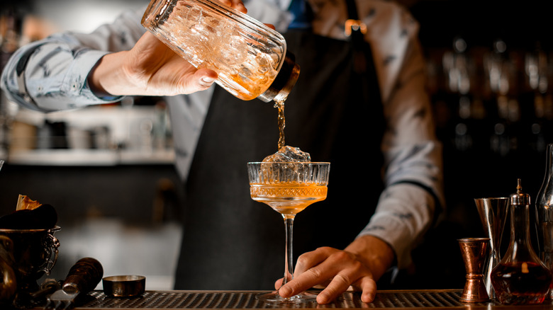 barman making a cocktail