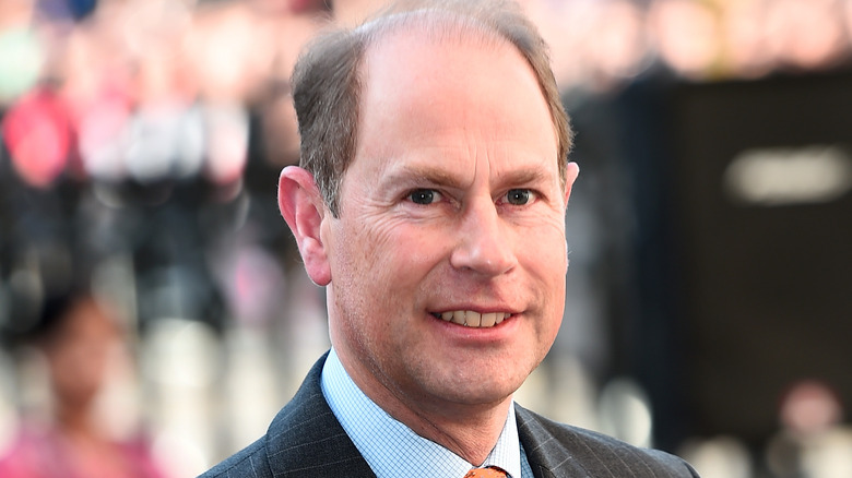 Prince Edward looks off-camera