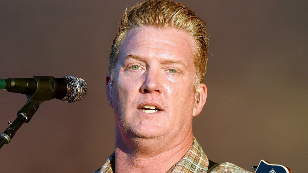 Josh Homme of Queens of the Stone Age at mic