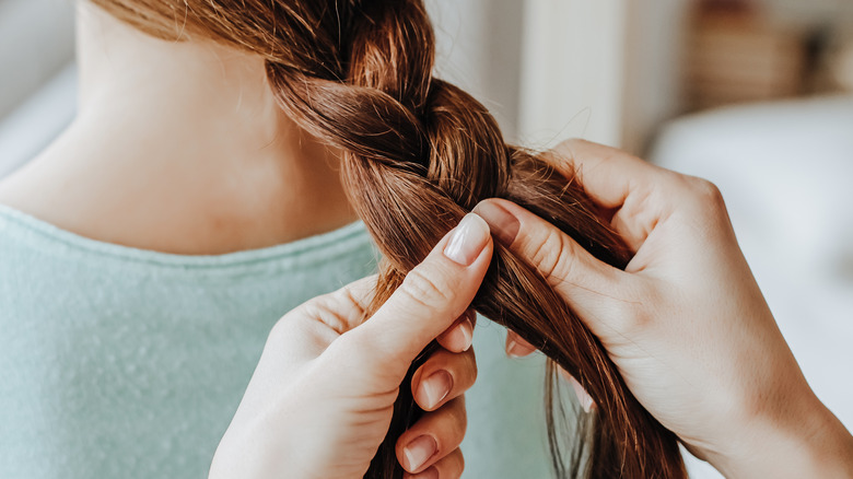 hair braiding long hands