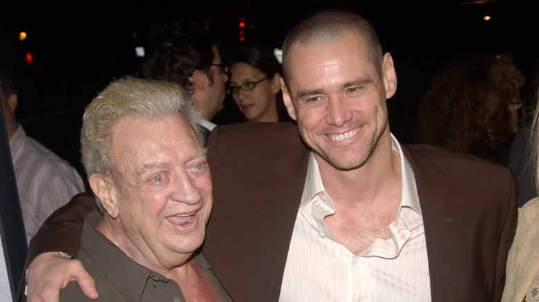 Rodney Dangerfield posing with Jim Carrey
