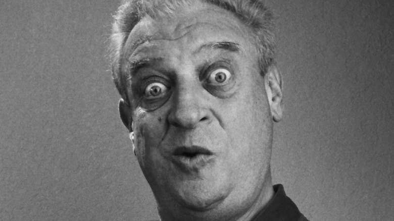 Rodney Dangerfield posing for a photo