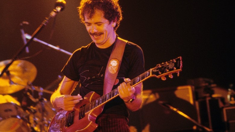 Carlos Santana playing guitar