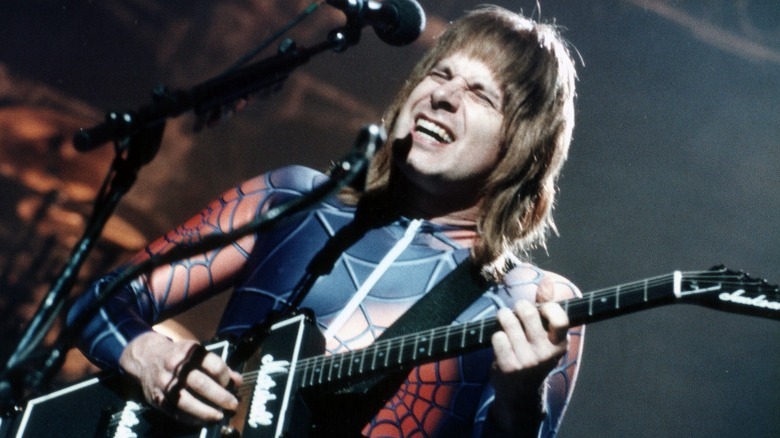 Nigel Tufnel playing guitar