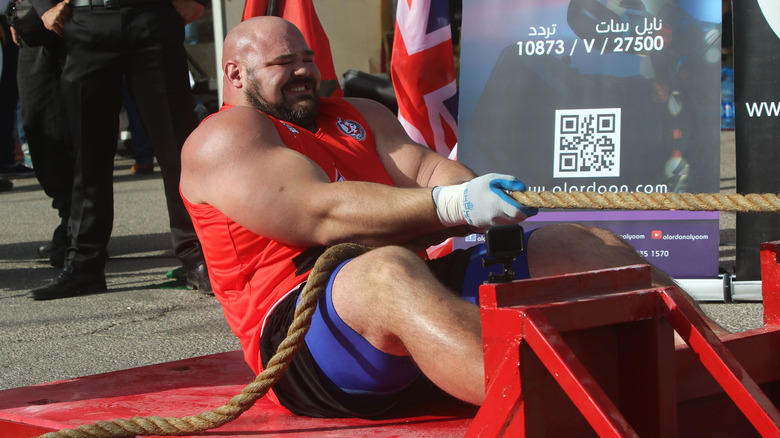 Brian Shaw competing pulling a rope