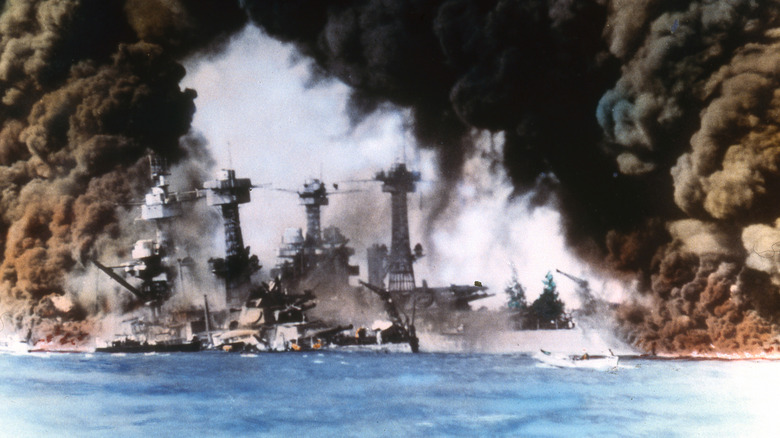 Smoke rises from Pearl Harbor