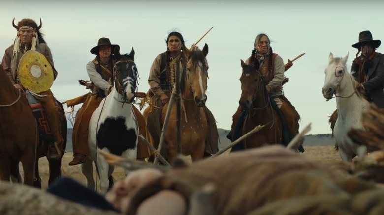 members of the crow tribe on horseback