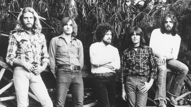 Eagles press photo from the 1970s by a wagon