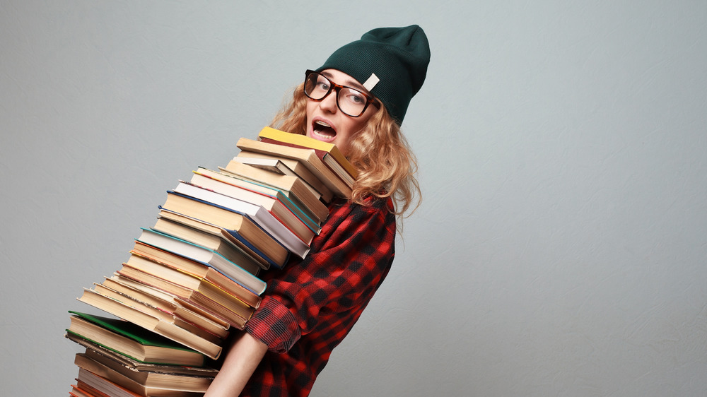 Woman carrying books