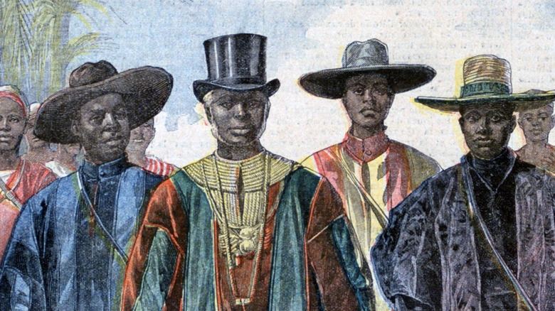 A group of Dahomeans stroll up the road