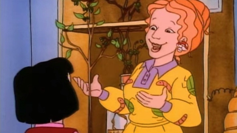 Ms. Frizzle speaking to a student in The Magic School Bus