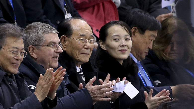 Kim Yo-jong clapping in stands
