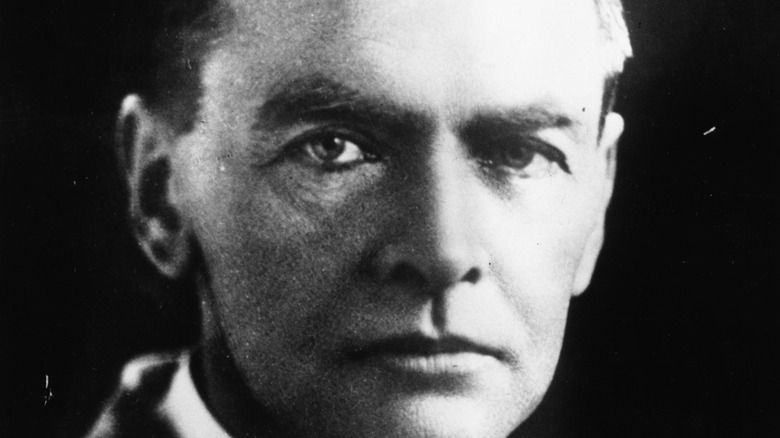 archeologist Sir Leonard Woolley scowling