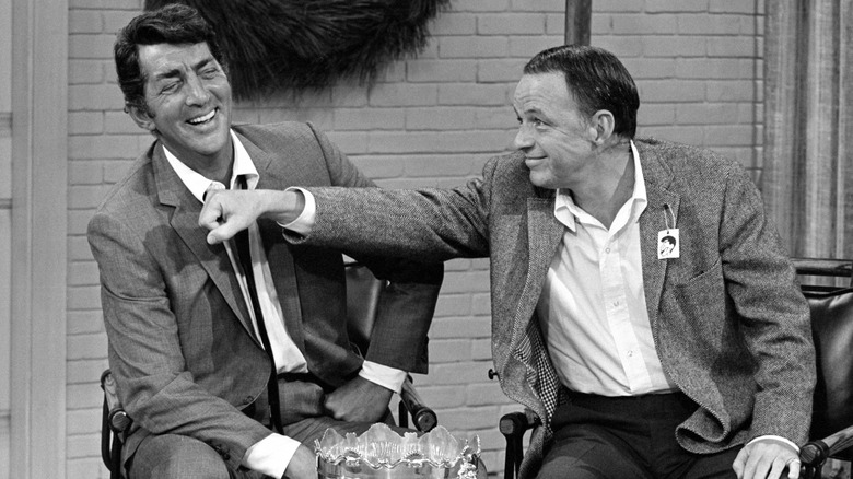 Dean Martin and Frank Sinatra laughing together