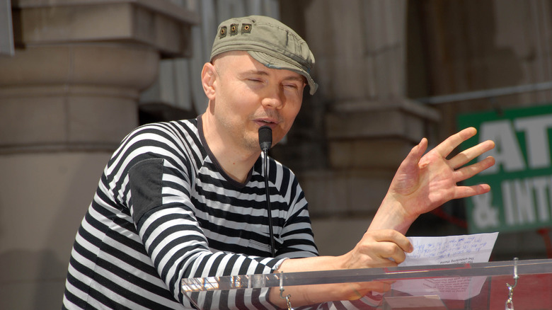 Billy Corgan standing at the podium