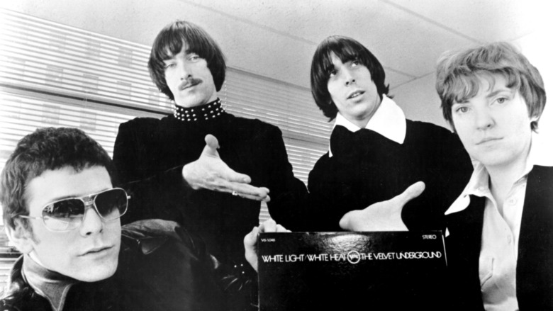 The Velvet Underground pointing to their album