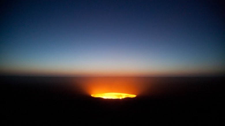 Fiery glow on horizon with dark foreground