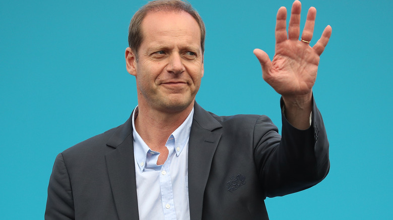 Christian Prudhomme waving hand