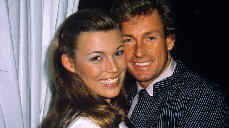 Vanna White and John Gibson smiling together