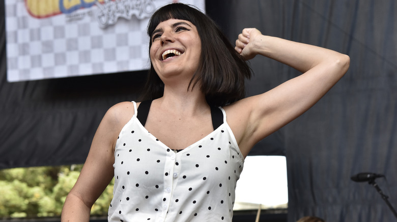 Smiling Nicolette Vilar on stage