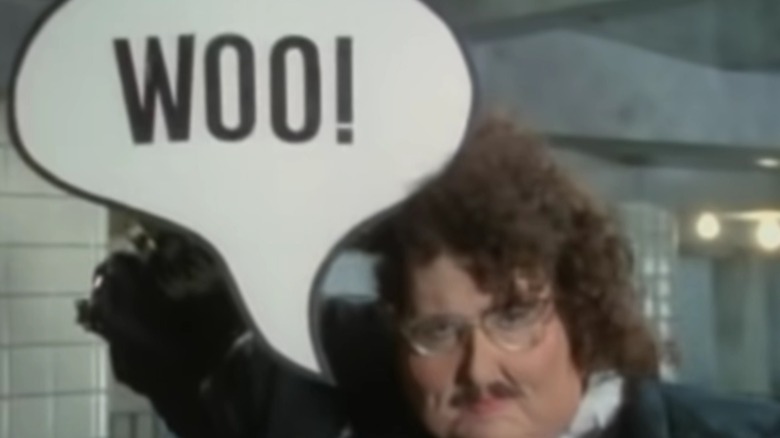 A still image from the video for "Fat" shows a heavier Weird Al Yankovic.