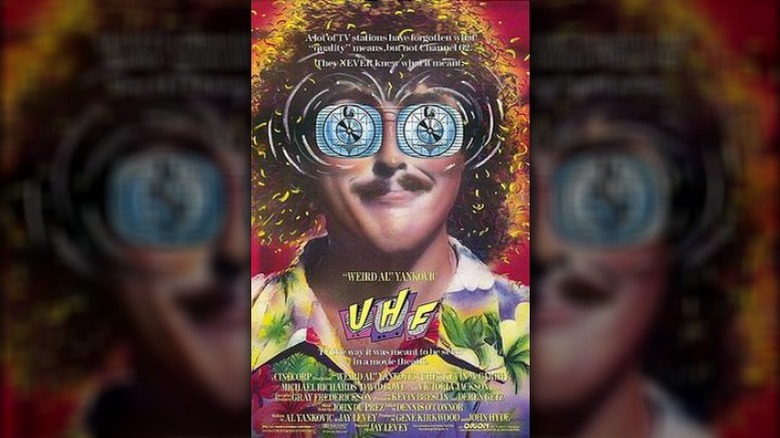 The UHF film poster shows Weird Al Yankovic with cartoon eyes.