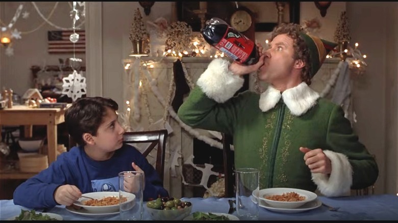Will Ferrell drinks soda from bottle in scene from Elf