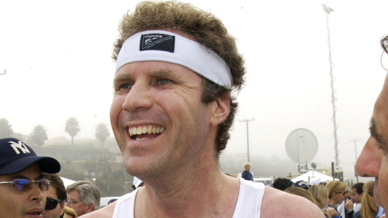 Will Ferrell smiling while running during a triathlon