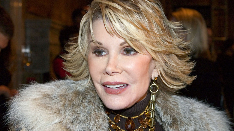 joan rivers in 2004 wearing fur coat