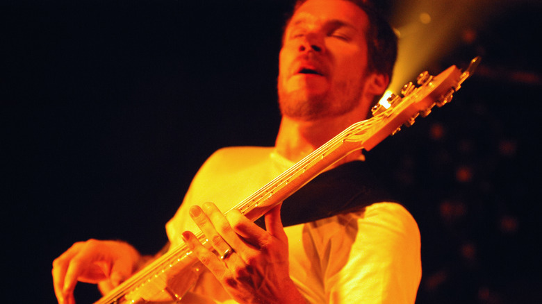 Tim Commerford performing with Audioslave in 2003