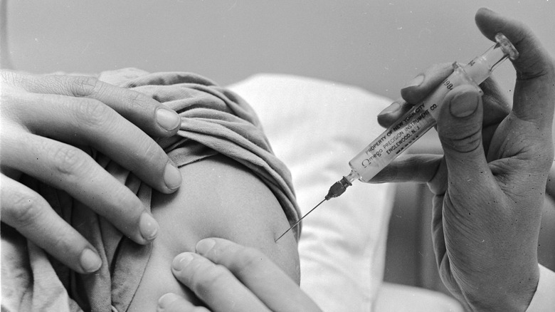 Giving an injection, 1950s