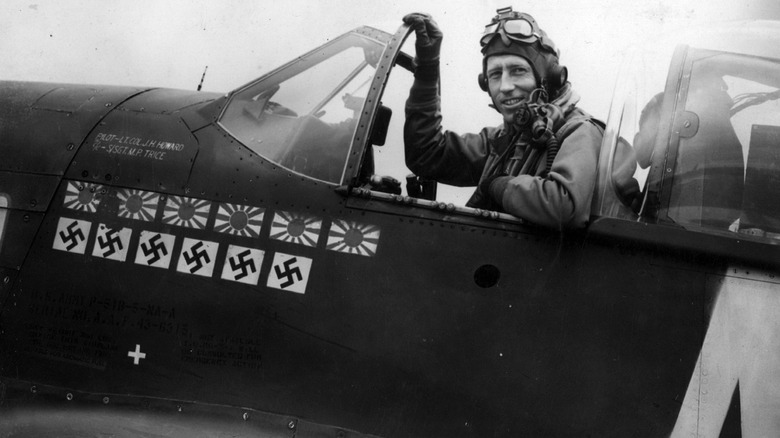 James Howard in plane with emblems commemorating kills of japanese and german craft