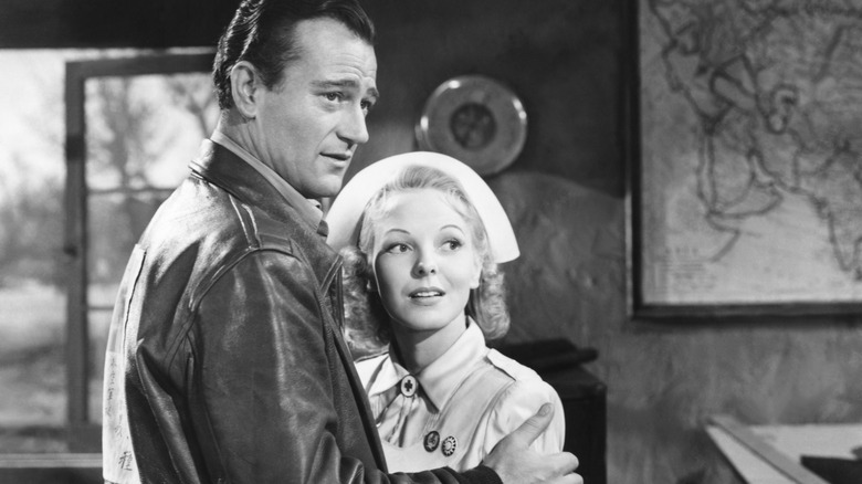 john wayne and anna lee in still for flying tigers film