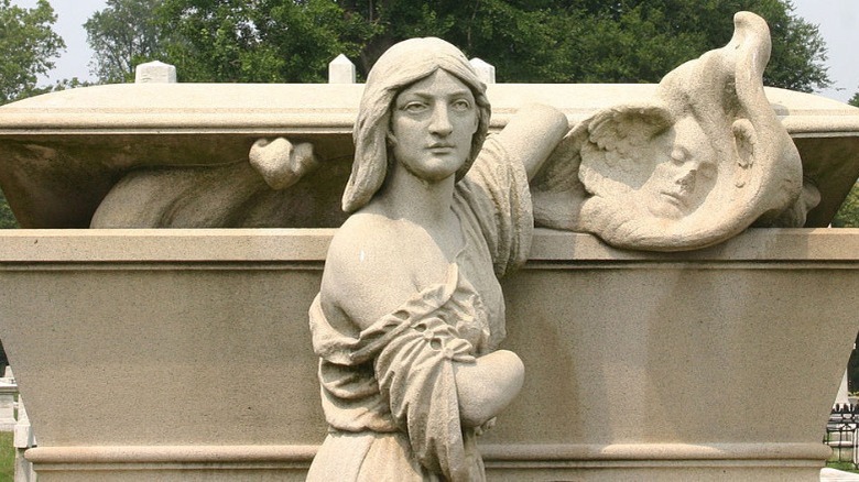 Laurel Hill Cemetery tombstone woman releasing soul