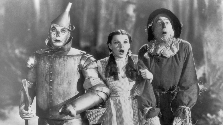 Judy Garland in The Wizard of Oz with The Lion and Tin Man