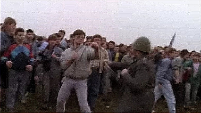An audience member with their dukes up confronting a USSR soldier
