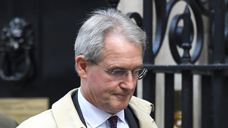 Owen Paterson looking down