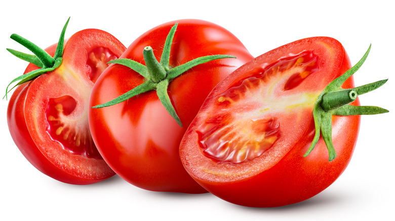 Tomatoes on white background