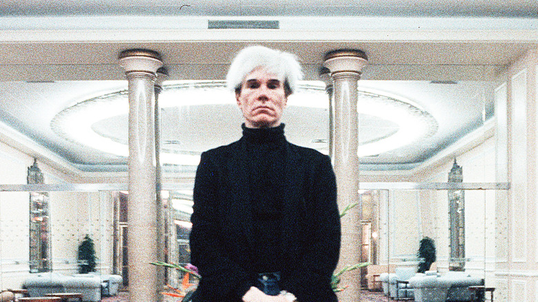 Andy Warhol in black turtleneck
