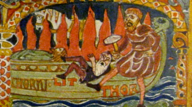 Thor kicks Litr into funeral pyre