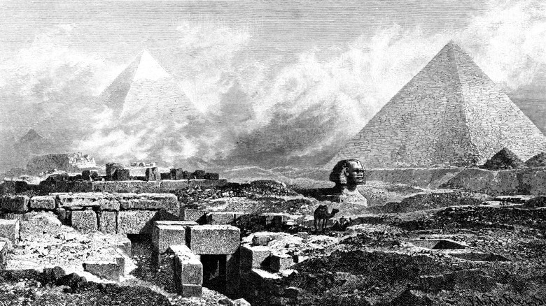 Black and white illustration of Pyramids and Sphinx